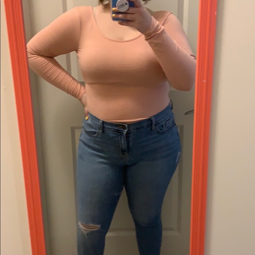 Pink body suit